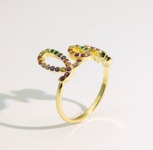 Colored diamond pave love ring